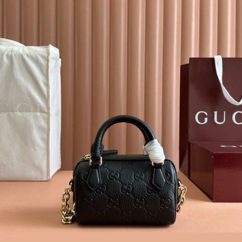 G*u*i satchel bags